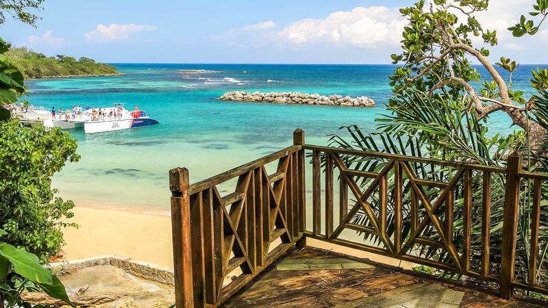 Turquoise sea and sunny sky at Dunn's River Falls beach, Ocho Rios, St Ann, Jamaica